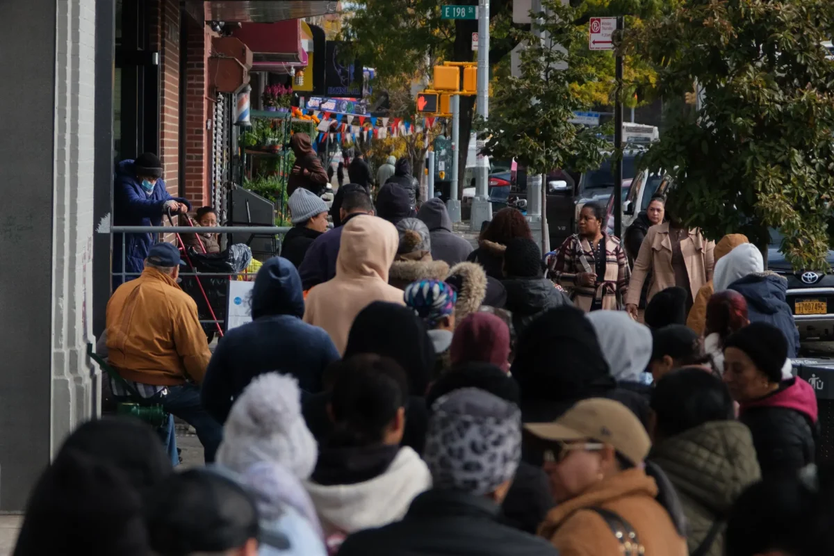 New Yorkers lined up outside a food pantry hoping to receive groceries. c/o The New York Times
